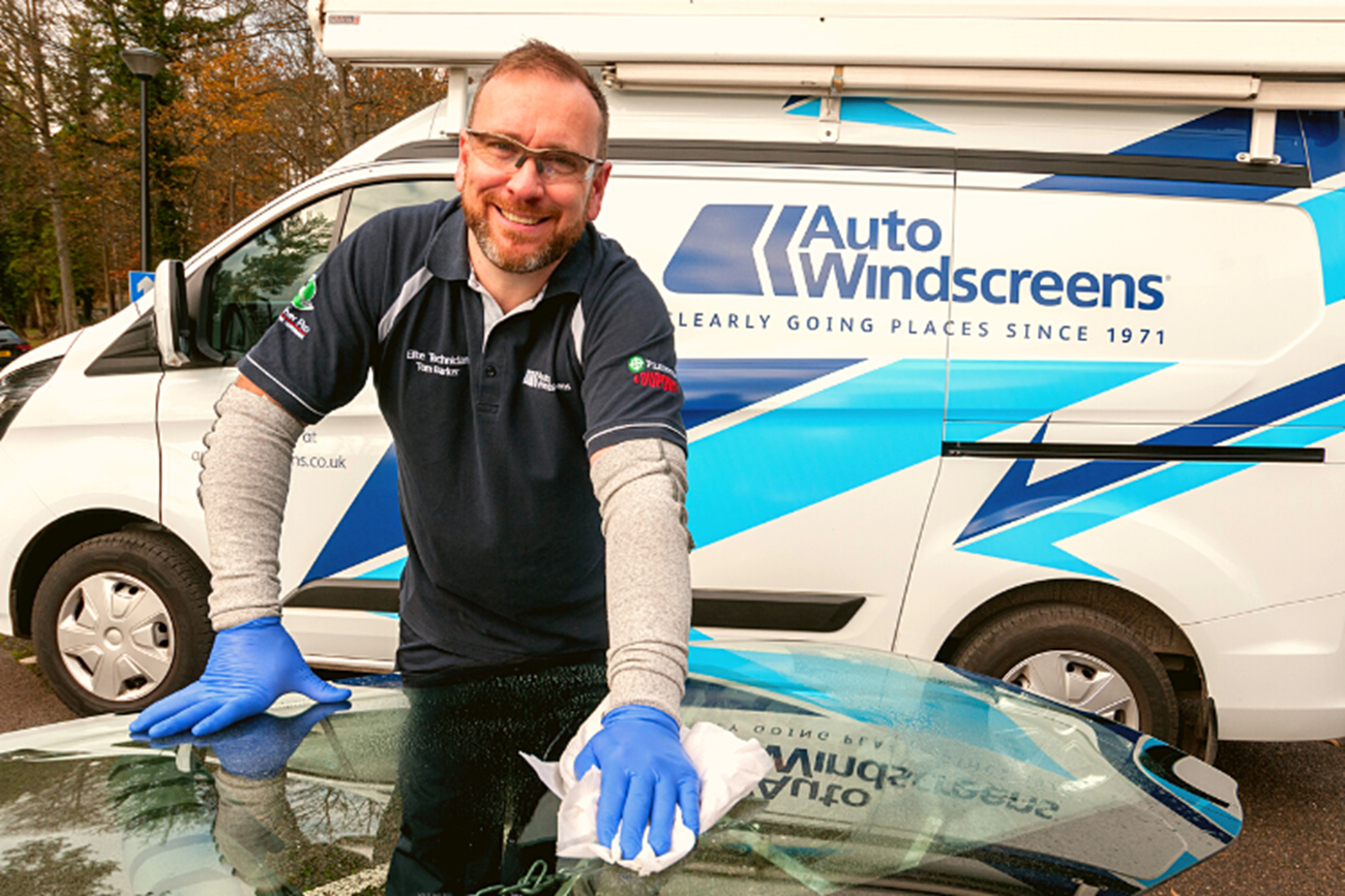 Technician preparing windscreen.png